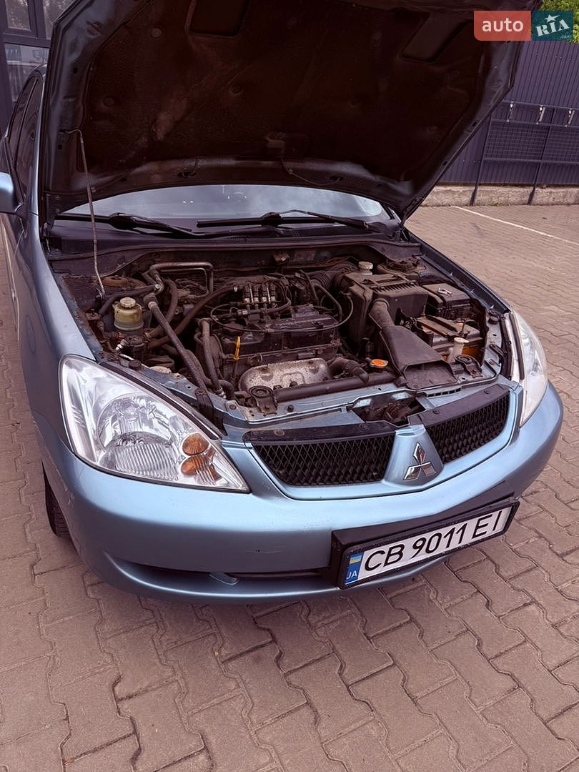 Mitsubishi Lancer 2008 VIN JMBSRCS3A8U007262 фото оголошення 14 з 21