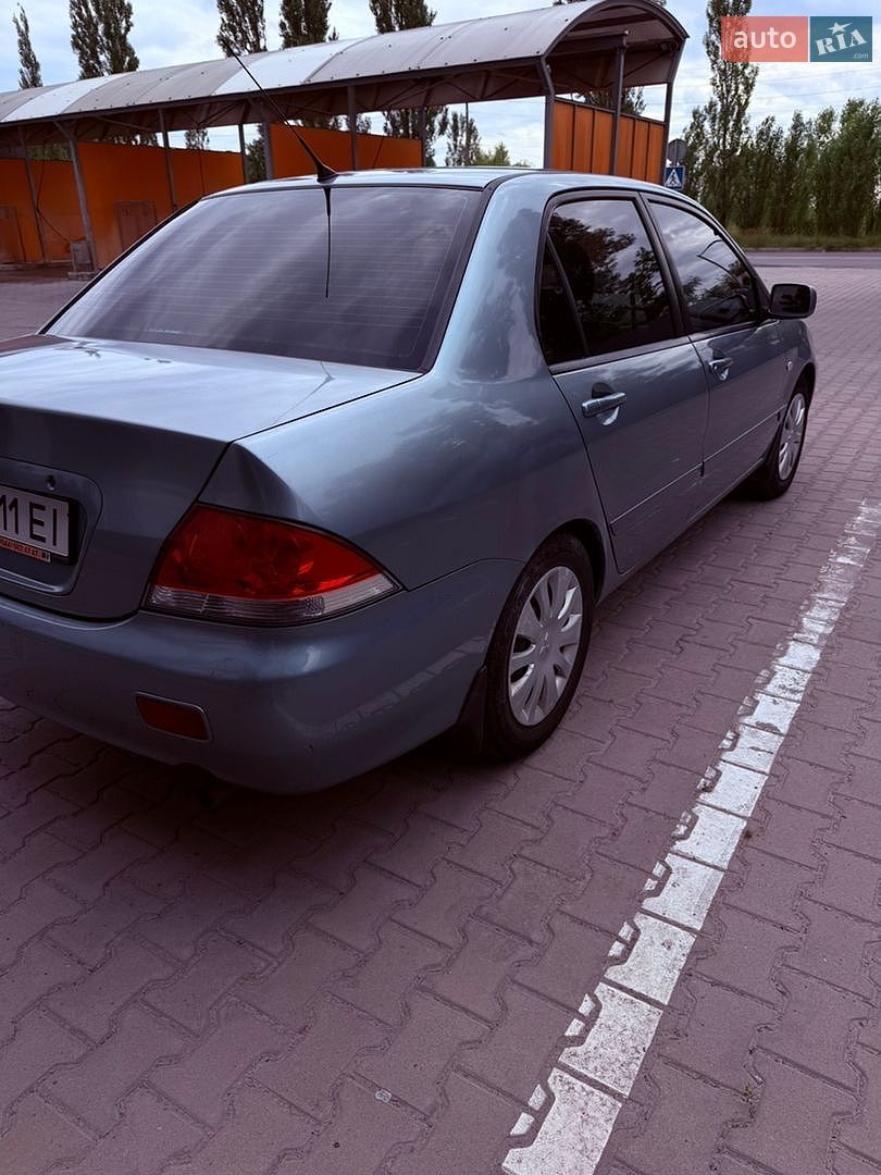 Mitsubishi Lancer 2008 VIN JMBSRCS3A8U007262 фото оголошення 6 з 21