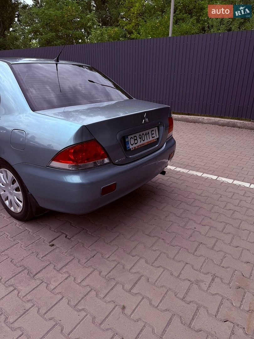 Mitsubishi Lancer 2008 VIN JMBSRCS3A8U007262 фото оголошення 7 з 21