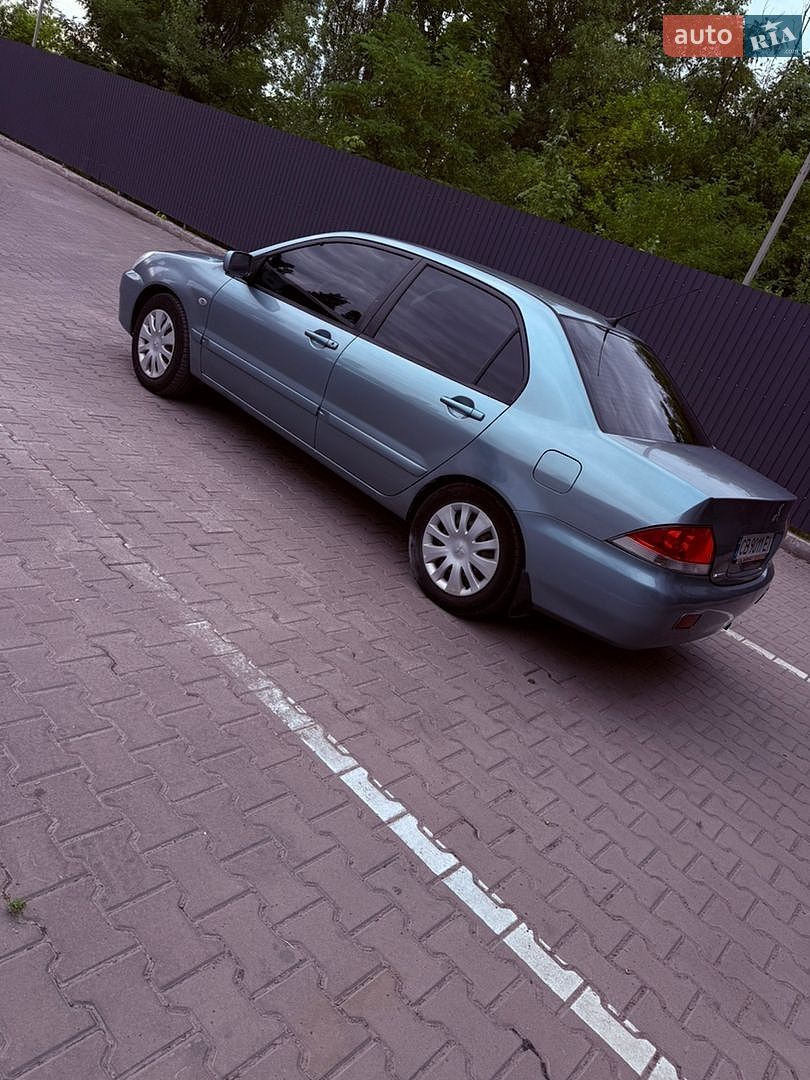 Mitsubishi Lancer 2008 VIN JMBSRCS3A8U007262 фото оголошення 5 з 21
