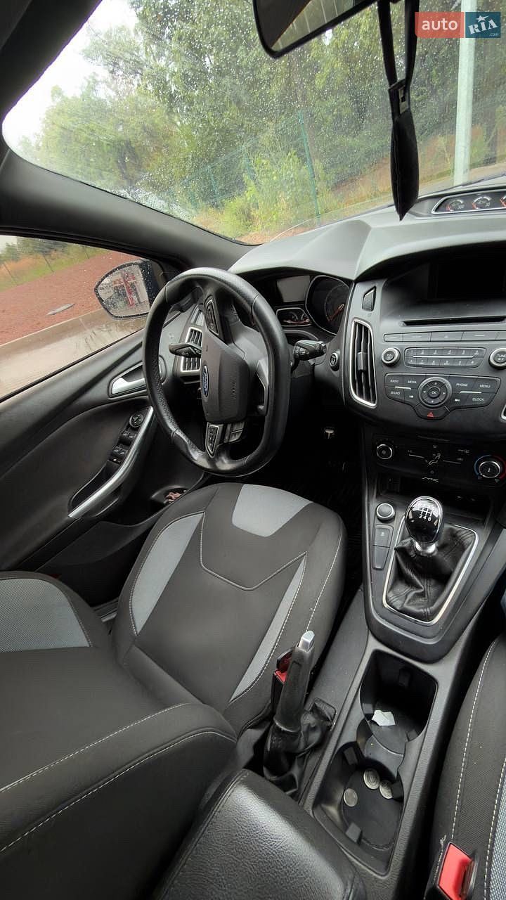 Ford Focus 2017 VIN 1FADP3L96HL310288 фото оголошення 12 з 20