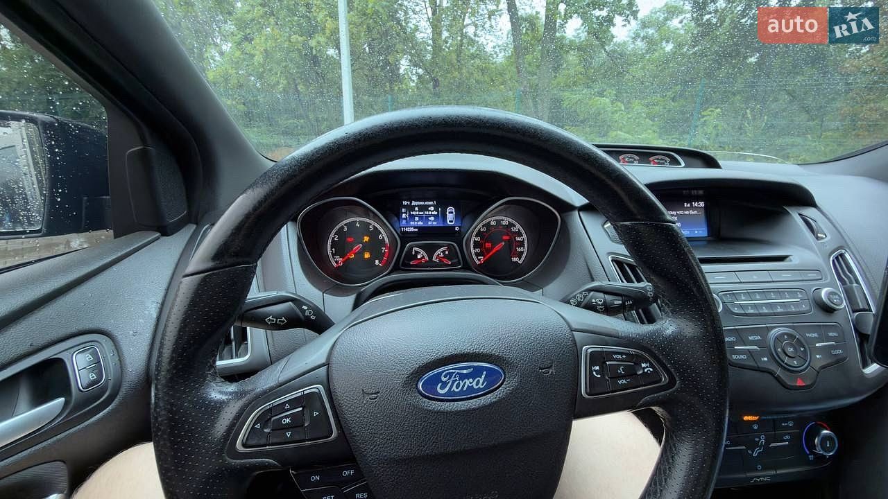 Ford Focus 2017 VIN 1FADP3L96HL310288 фото оголошення 14 з 20