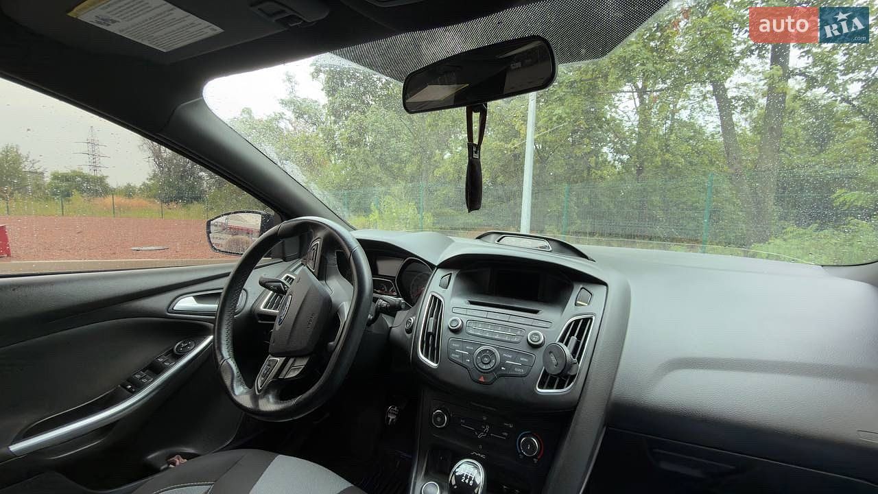 Ford Focus 2017 VIN 1FADP3L96HL310288 фото оголошення 17 з 20