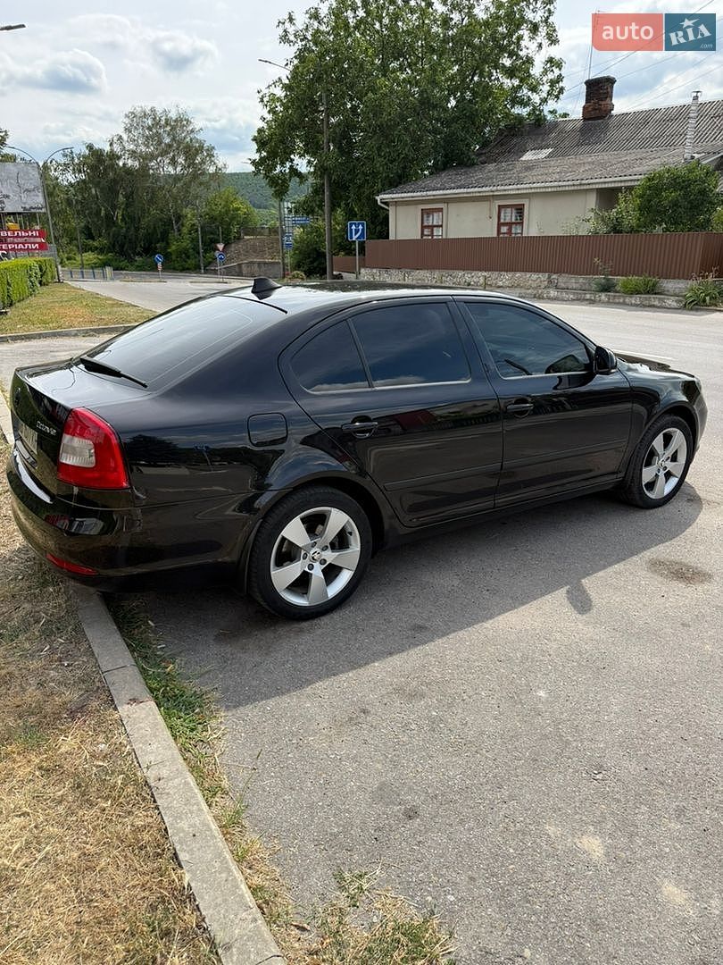 Skoda Octavia 2012 VIN TMBCE61Z2C2141675 фото оголошення 4 з 28