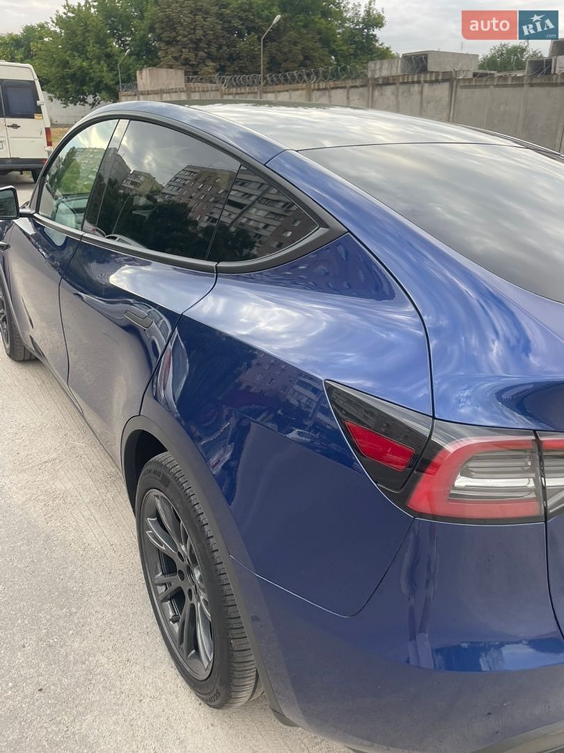 Tesla Model Y 2024 VIN 7SAYGAEE4RF202351 фото оголошення 4 з 21