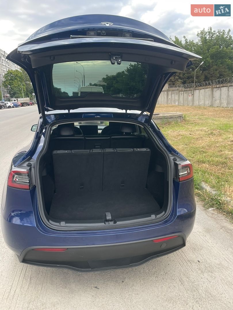 Tesla Model Y 2024 VIN 7SAYGAEE4RF202351 фото оголошення 8 з 21