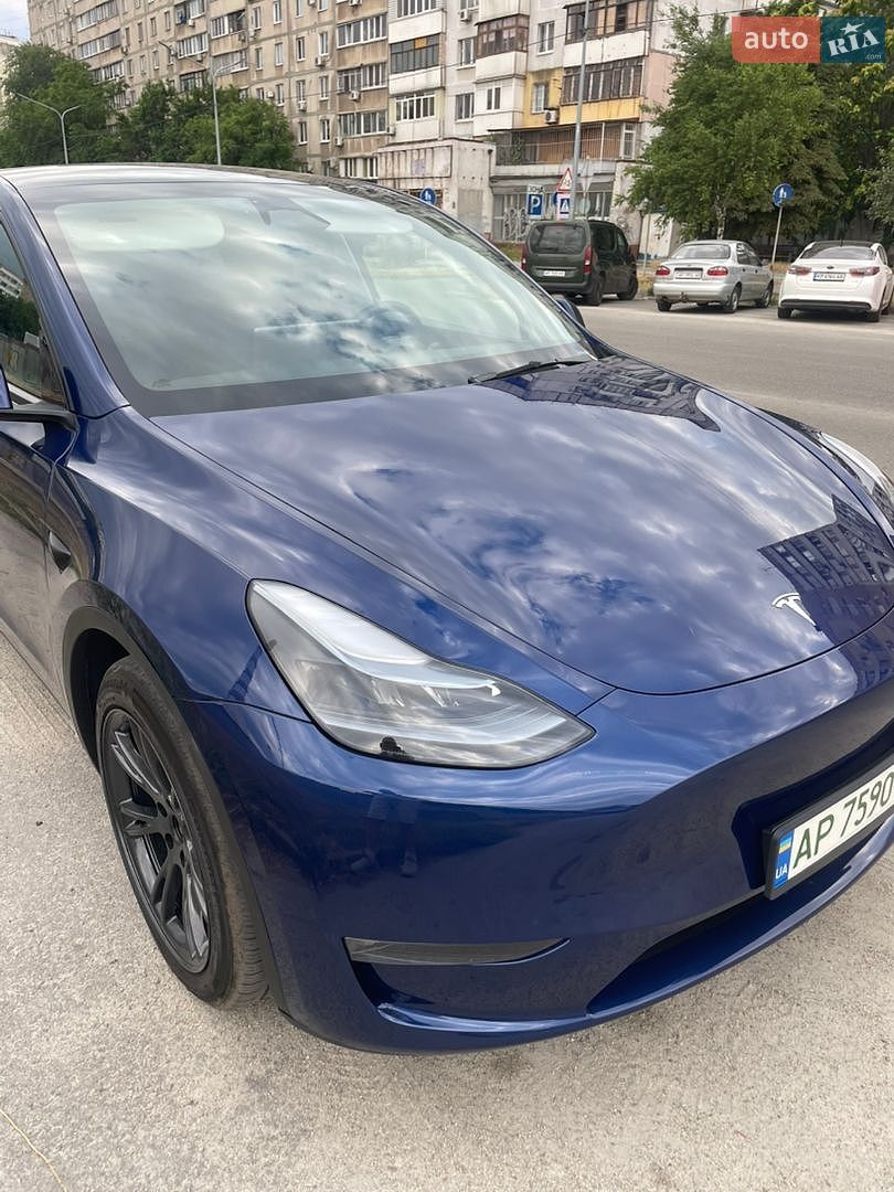 Tesla Model Y 2024 VIN 7SAYGAEE4RF202351 фото оголошення 5 з 21