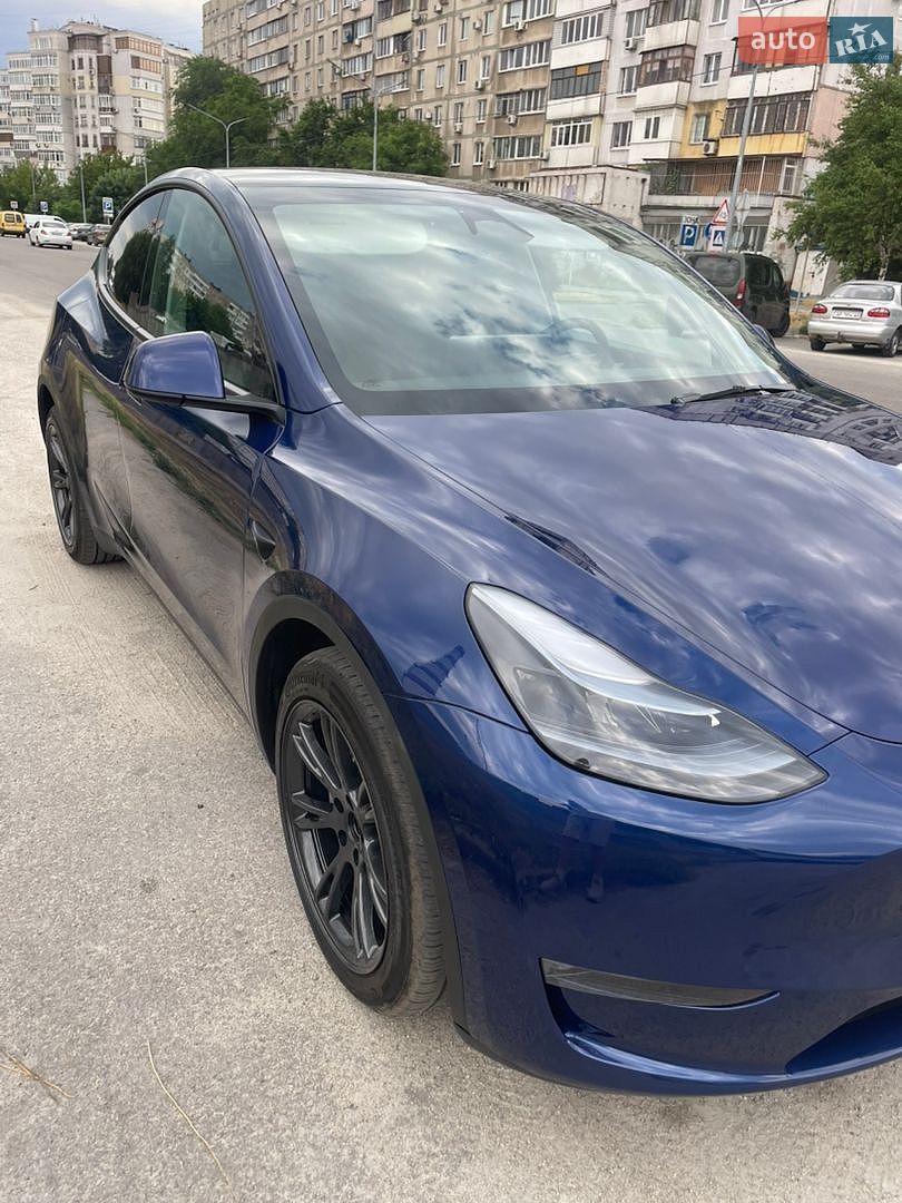 Tesla Model Y 2024 VIN 7SAYGAEE4RF202351 фото оголошення 6 з 21