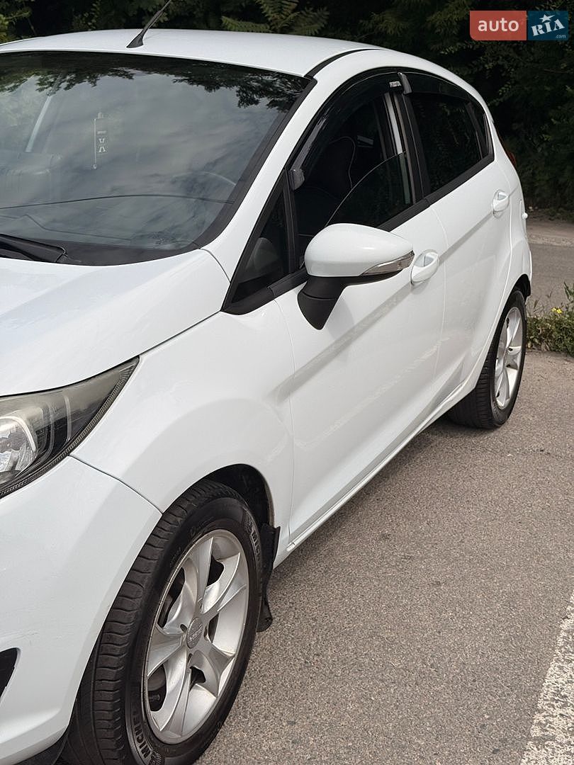 Ford Fiesta 2013 VIN WF0DXXGAKDDG32418 фото оголошення 12 з 16
