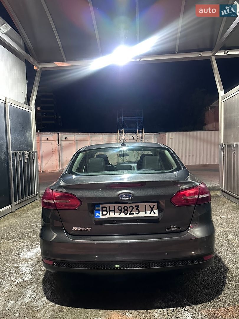 Ford Focus 2016 VIN 1FADP3F28GL389833 фото оголошення 7 з 9