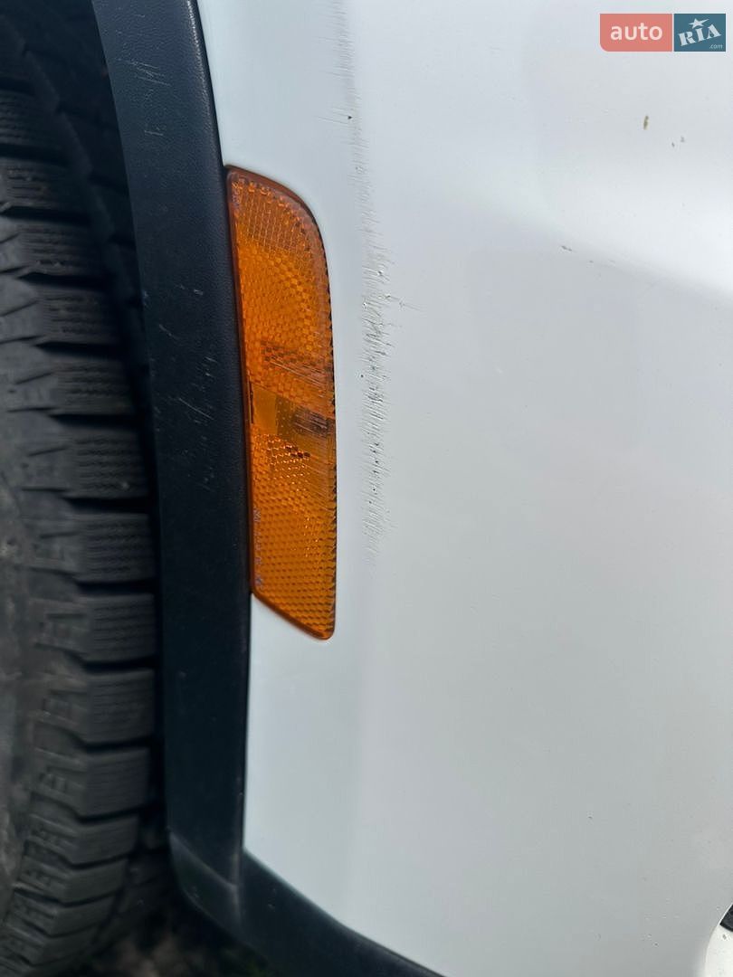 Volkswagen Tiguan 2012 VIN WVGBV7AX5DW548833 фото оголошення 12 з 15