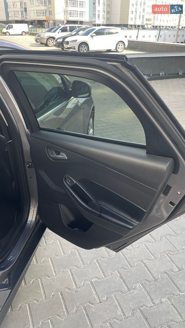 Ford Focus 2013 VIN WF0LXXGCBLDR01917 фото оголошення 16 з 19