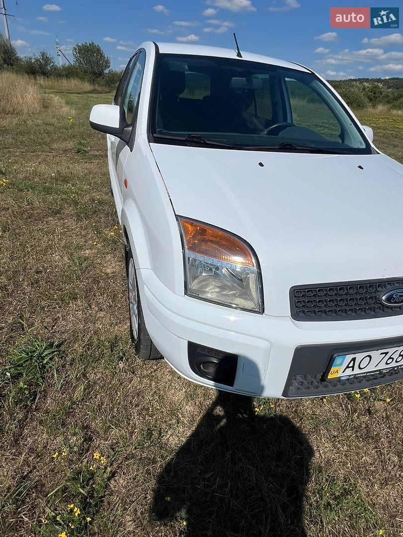 Ford Fusion 2012 VIN WF0UXXGAJUCG49842 фото оголошення 11 з 31