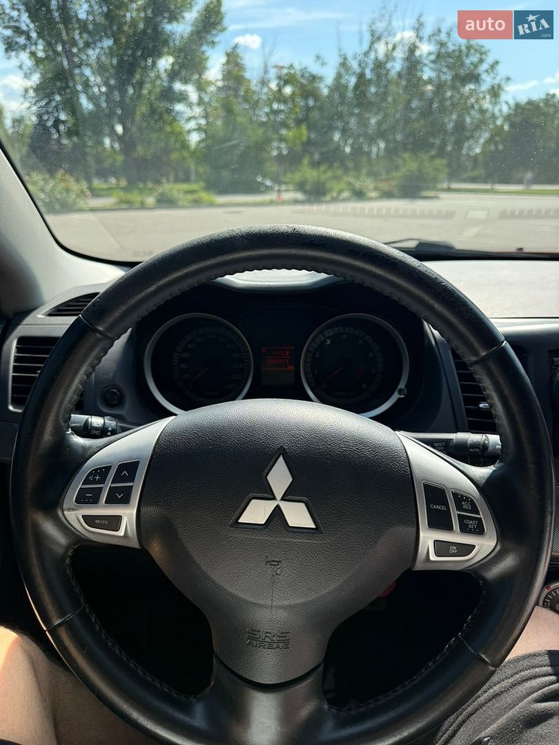 Mitsubishi Lancer 2009 VIN JMBSNCY4A9U002130 фото оголошення 8 з 11