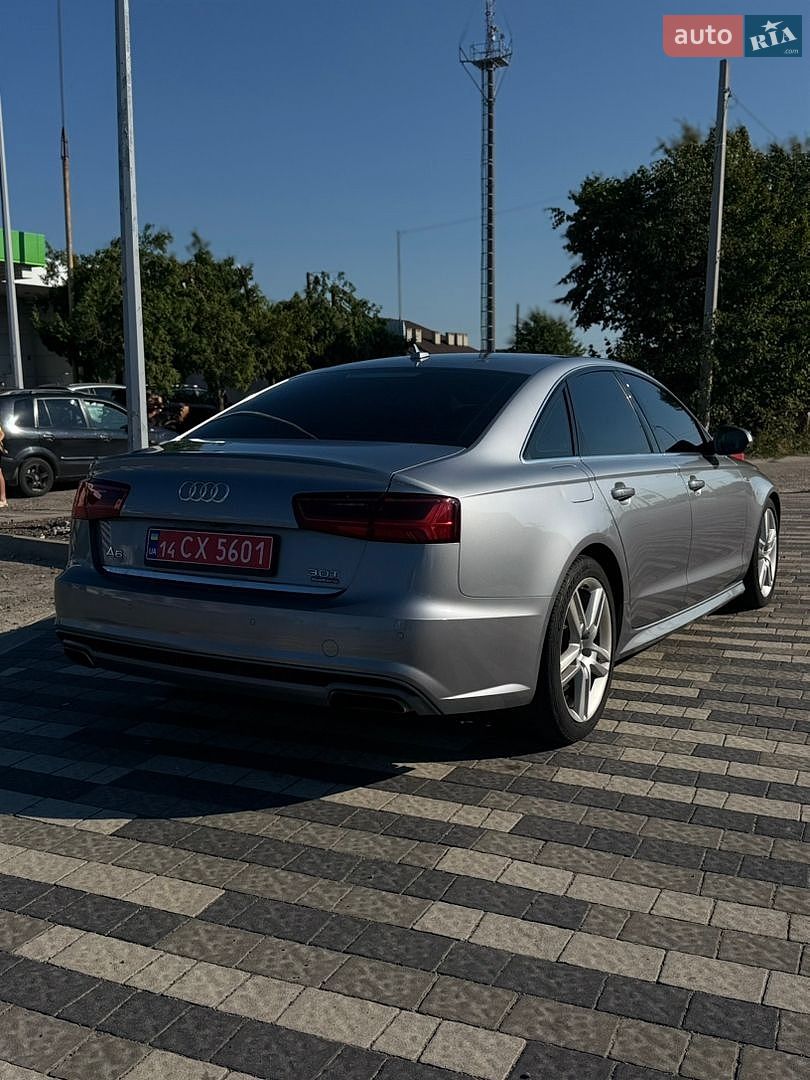 Audi A6 2015 VIN WAUFGAFC1GN059498 фото оголошення 3 з 9