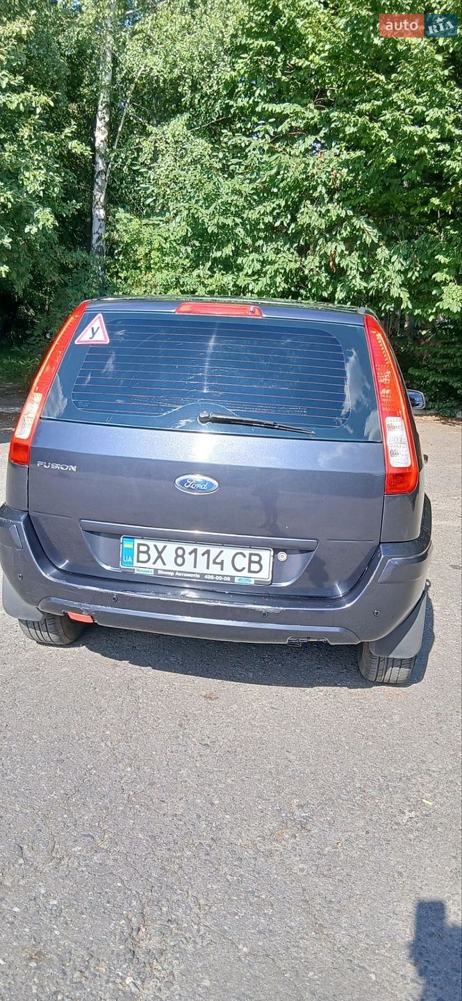 Ford Fusion 2010 VIN WF0UXXGAJUAM26207 фото оголошення 5 з 16