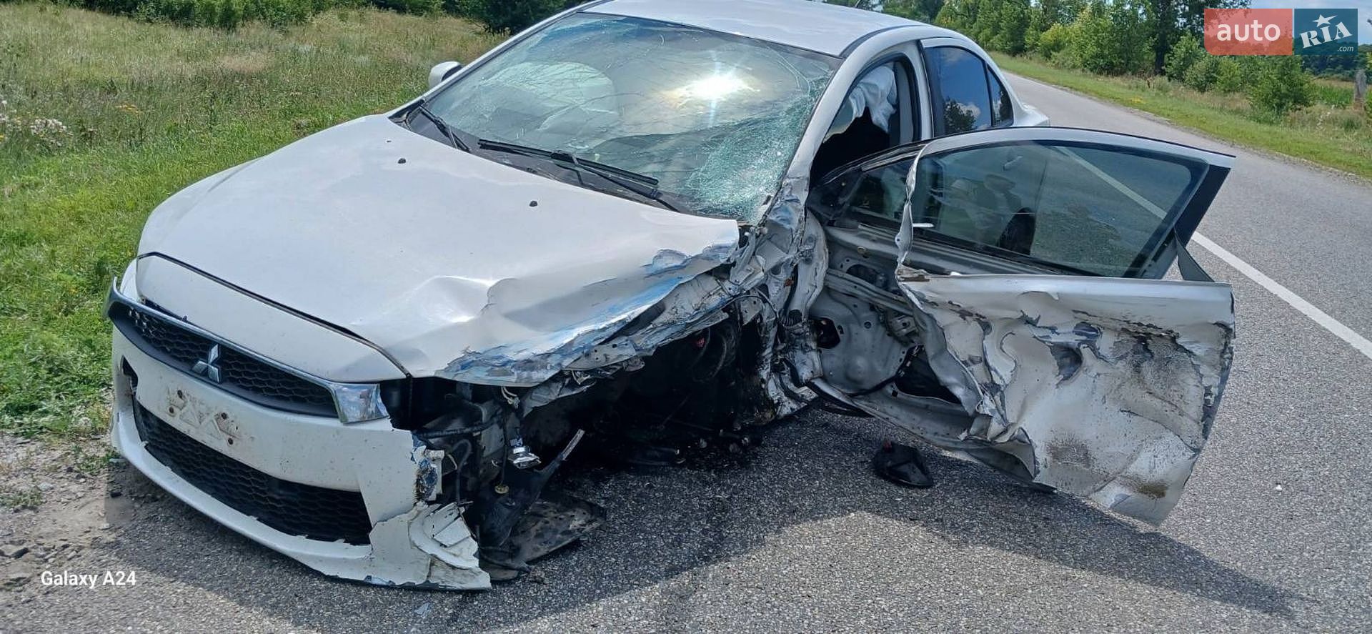 Mitsubishi Lancer 2016 VIN JA32U2FUXHU004823 фото оголошення 6 з 10