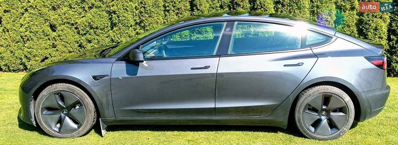 Tesla Model 3 2023 VIN 5YJ3E1EB2PF659207 фото оголошення 4 з 7