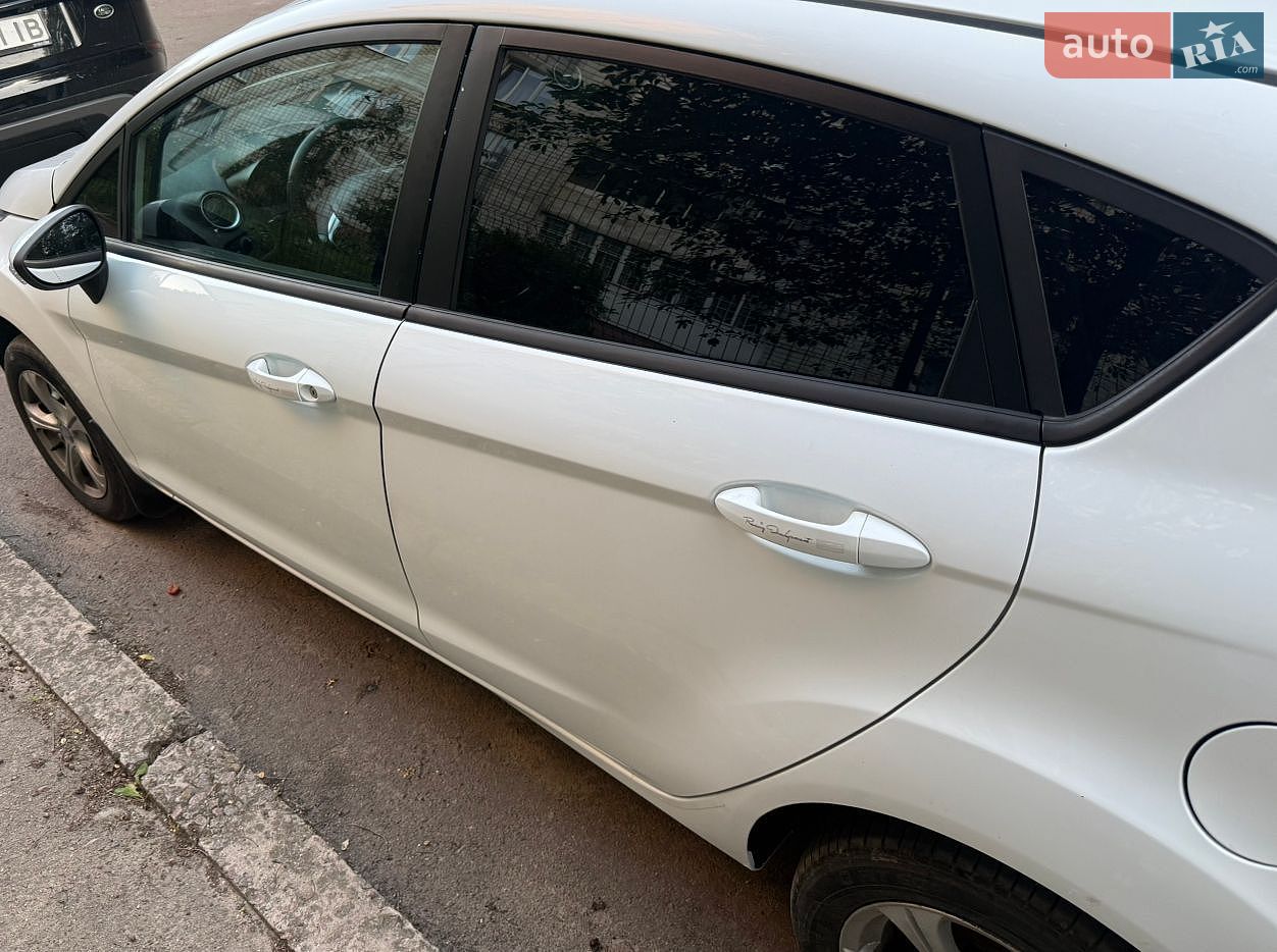 Ford Fiesta 2012 VIN WF0DXXGAKDCS63363 фото оголошення 2 з 26