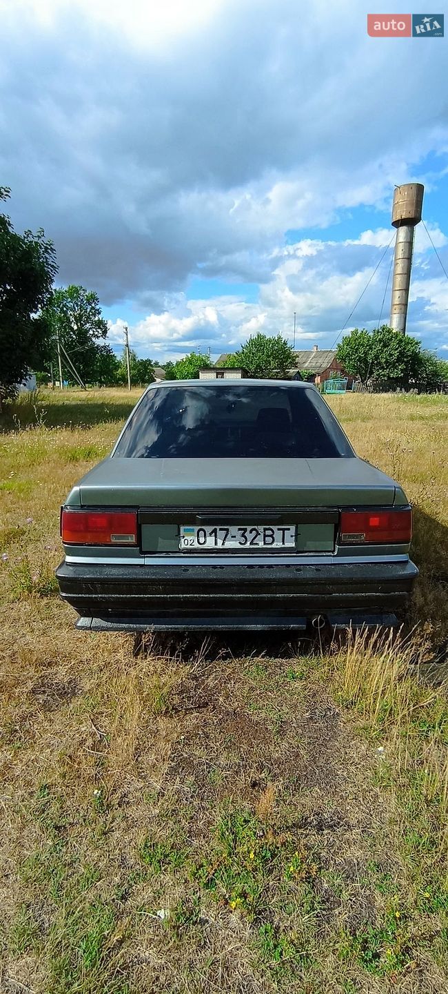 Nissan Bluebird 1987 VIN JN100HT12V0112280 фото оголошення 7 з 9