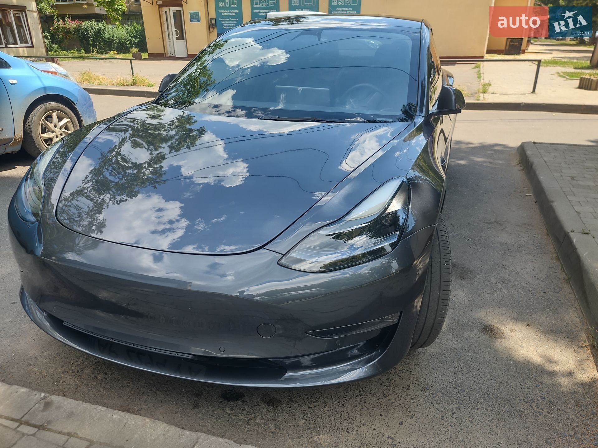 Tesla Model 3 2023 VIN 5YJ3E1EA7PF699970 фото оголошення 11 з 12