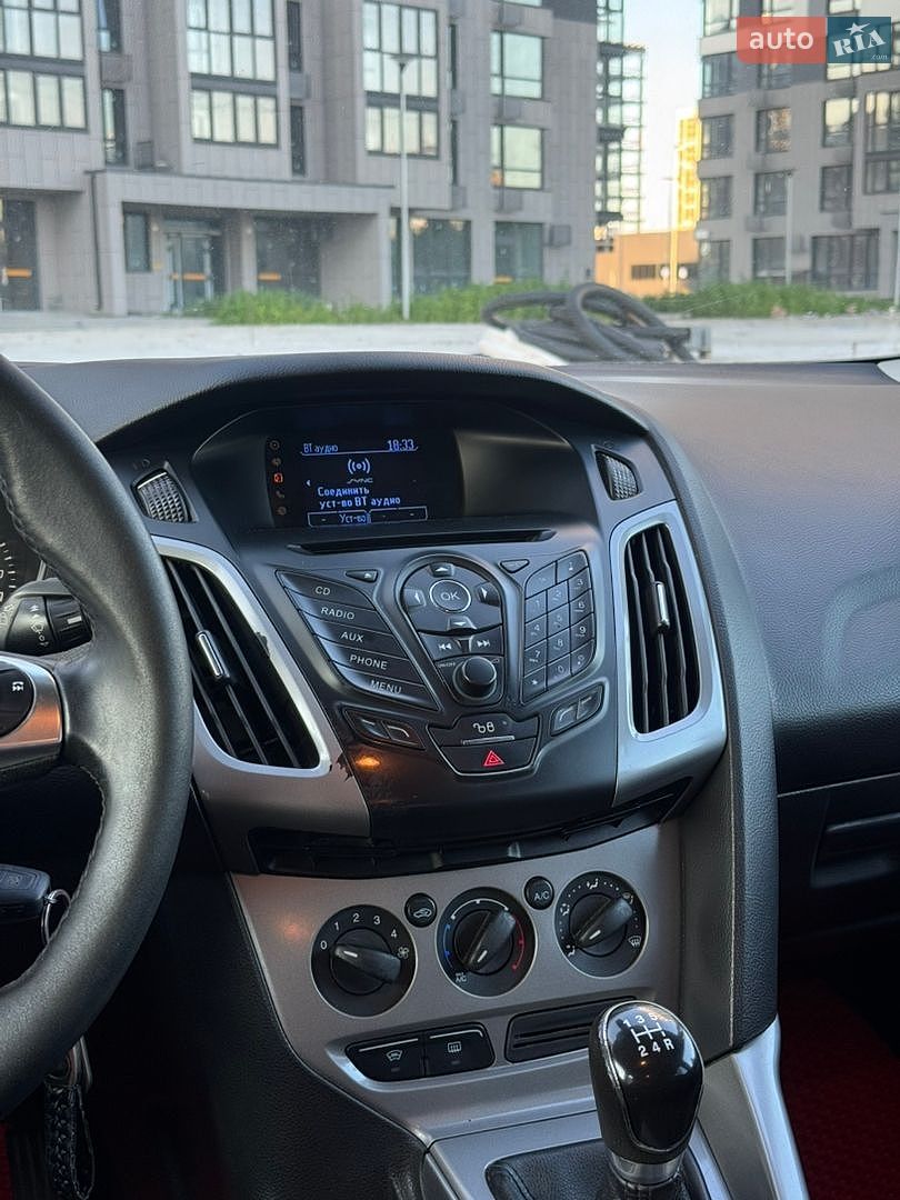 Ford Focus 2013 VIN WF0LXXGCBLDM25264 фото оголошення 12 з 15