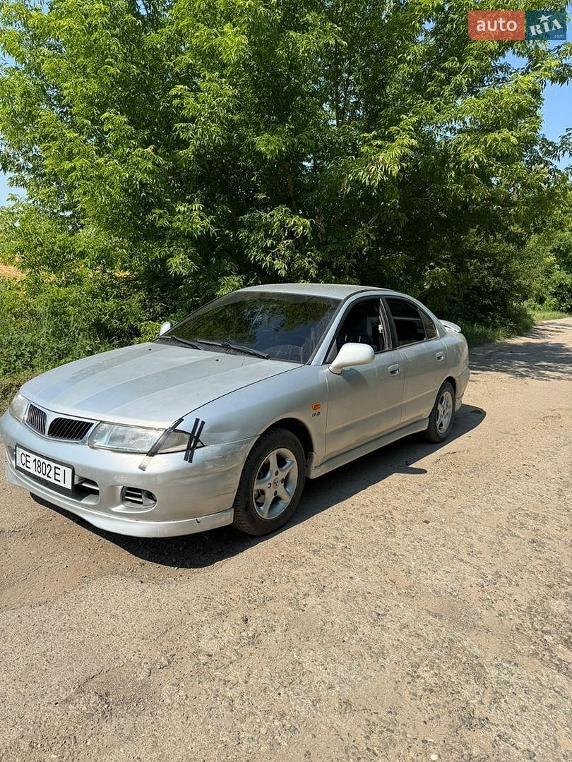 Mitsubishi Carisma 1997 VIN XMCLNDA2AVF031535 фото оголошення 7 з 9