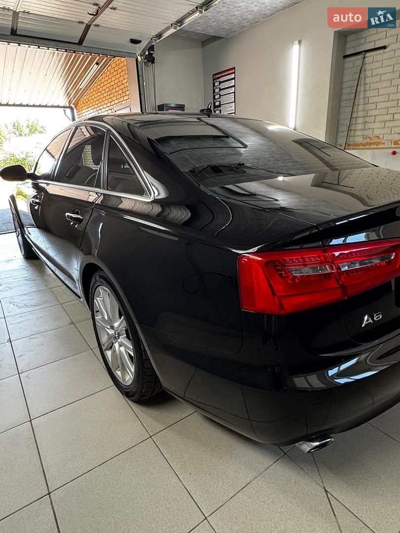 Audi A6 2014 VIN WAUGFAFC3FN008090 фото оголошення 4 з 49