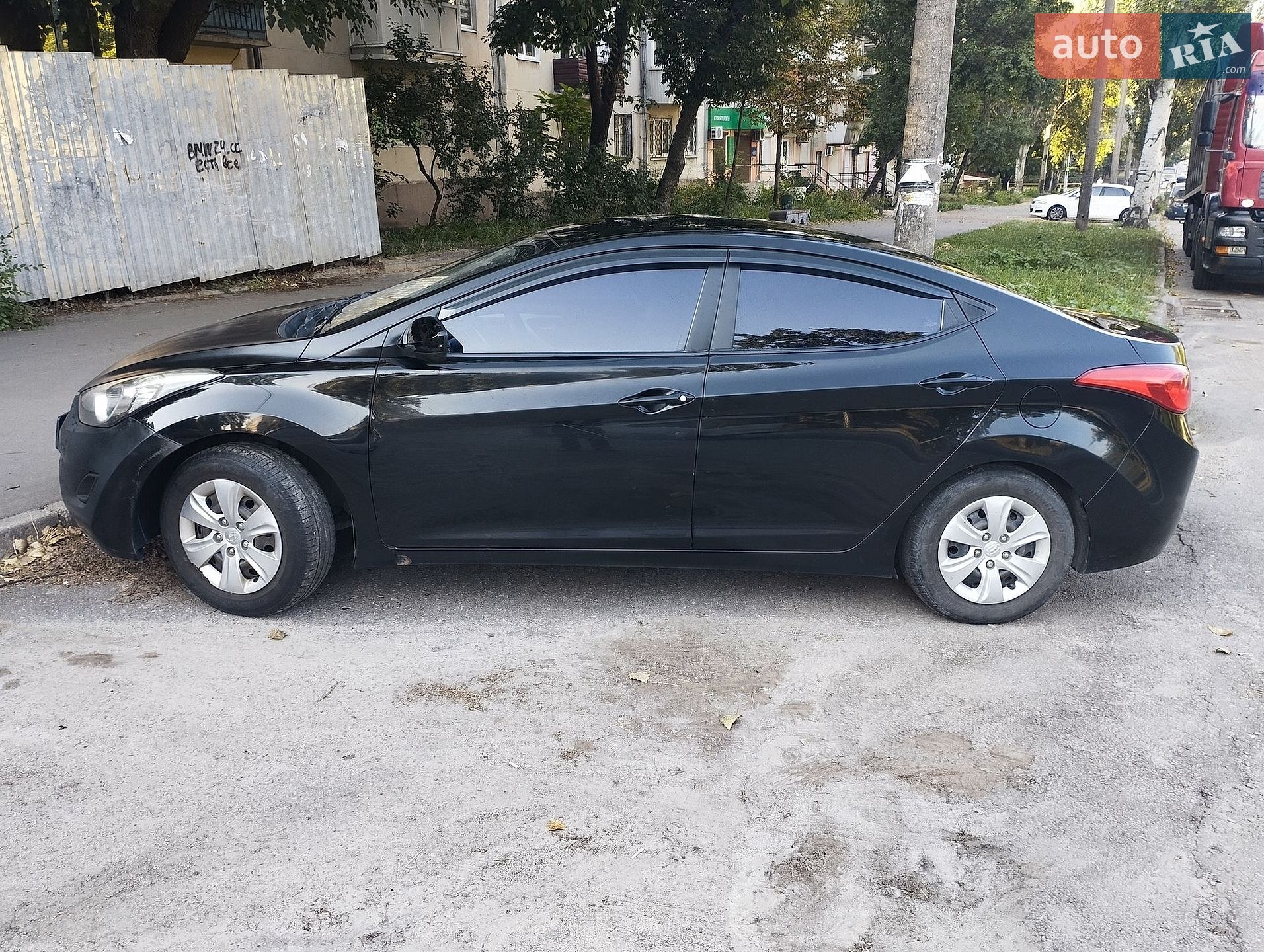Hyundai Elantra 2013 VIN KMHDH41CADU903666 фото оголошення 5 з 10