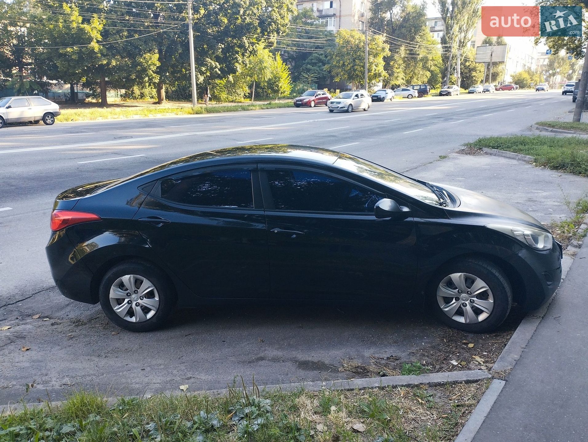 Hyundai Elantra 2013 VIN KMHDH41CADU903666 фото оголошення 2 з 10