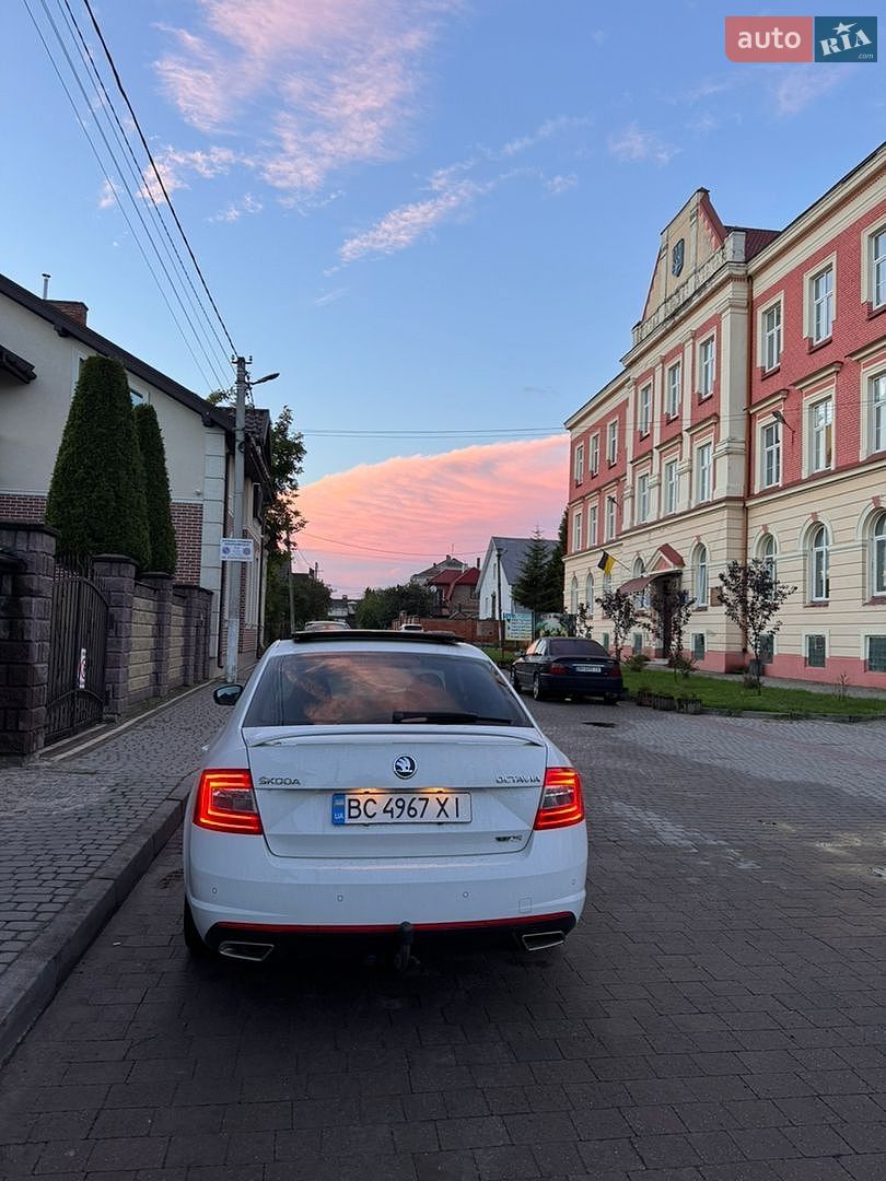 Skoda Octavia 2014 VIN TMBAK7NE6E0194326 фото оголошення 4 з 7