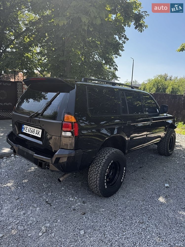 Mitsubishi Pajero Sport 2002 VIN JMB0RK9602J000220 фото оголошення 4 з 11