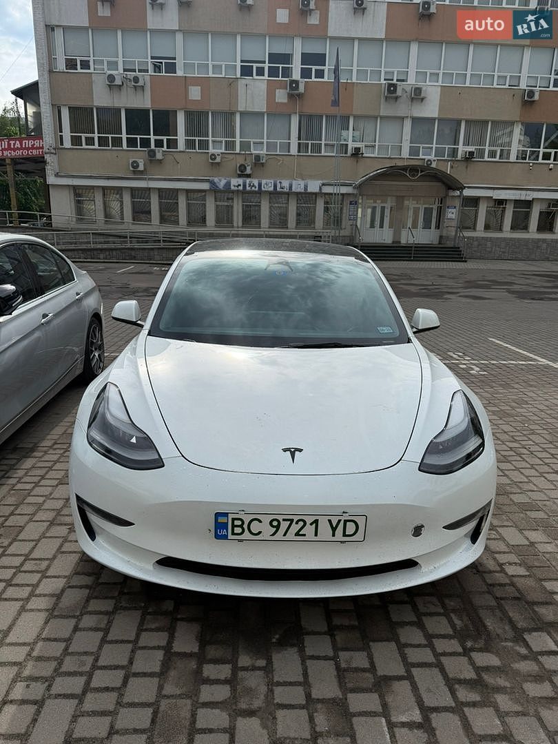 Tesla Model 3 2023 VIN 5YJ3E1EC6PF619804 фото оголошення 14 з 15