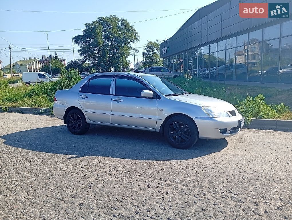 Mitsubishi Lancer 2011 VIN JMYSRCS3ABU000441 фото оголошення 5 з 18