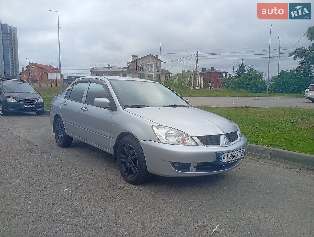 Mitsubishi Lancer 2011 VIN JMYSRCS3ABU000441 фото оголошення 8 з 18