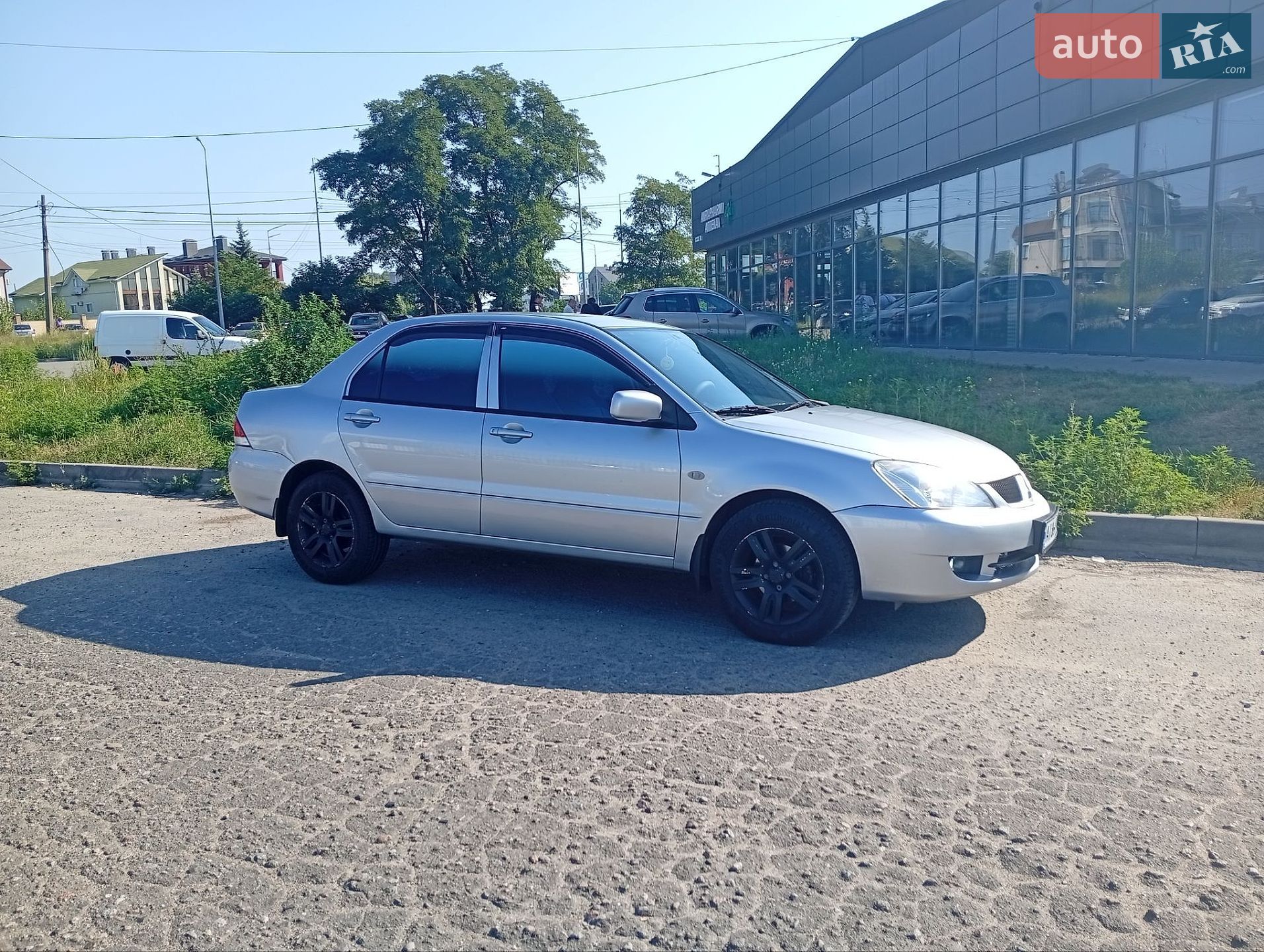 Mitsubishi Lancer 2011 VIN JMYSRCS3ABU000441 фото оголошення 14 з 18