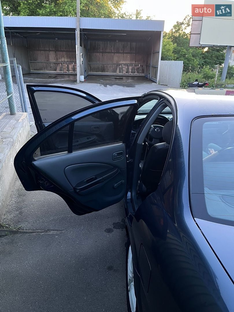 Nissan Almera 2007 VIN KNMCSHLMS7P678119 фото оголошення 12 з 47