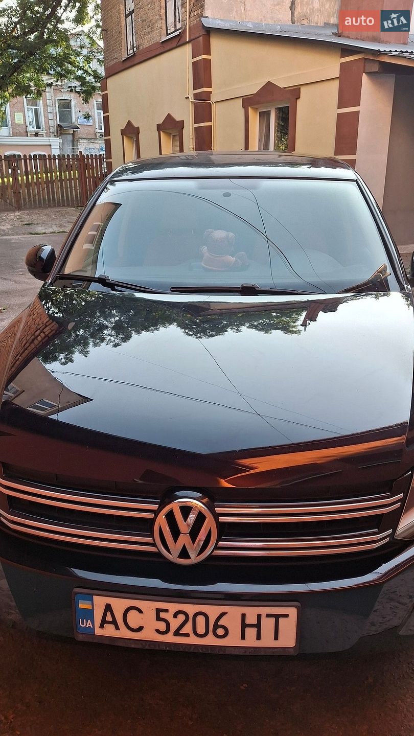 Volkswagen Tiguan 2012 VIN WVGAV7AX0CW589705 фото оголошення 3 з 6