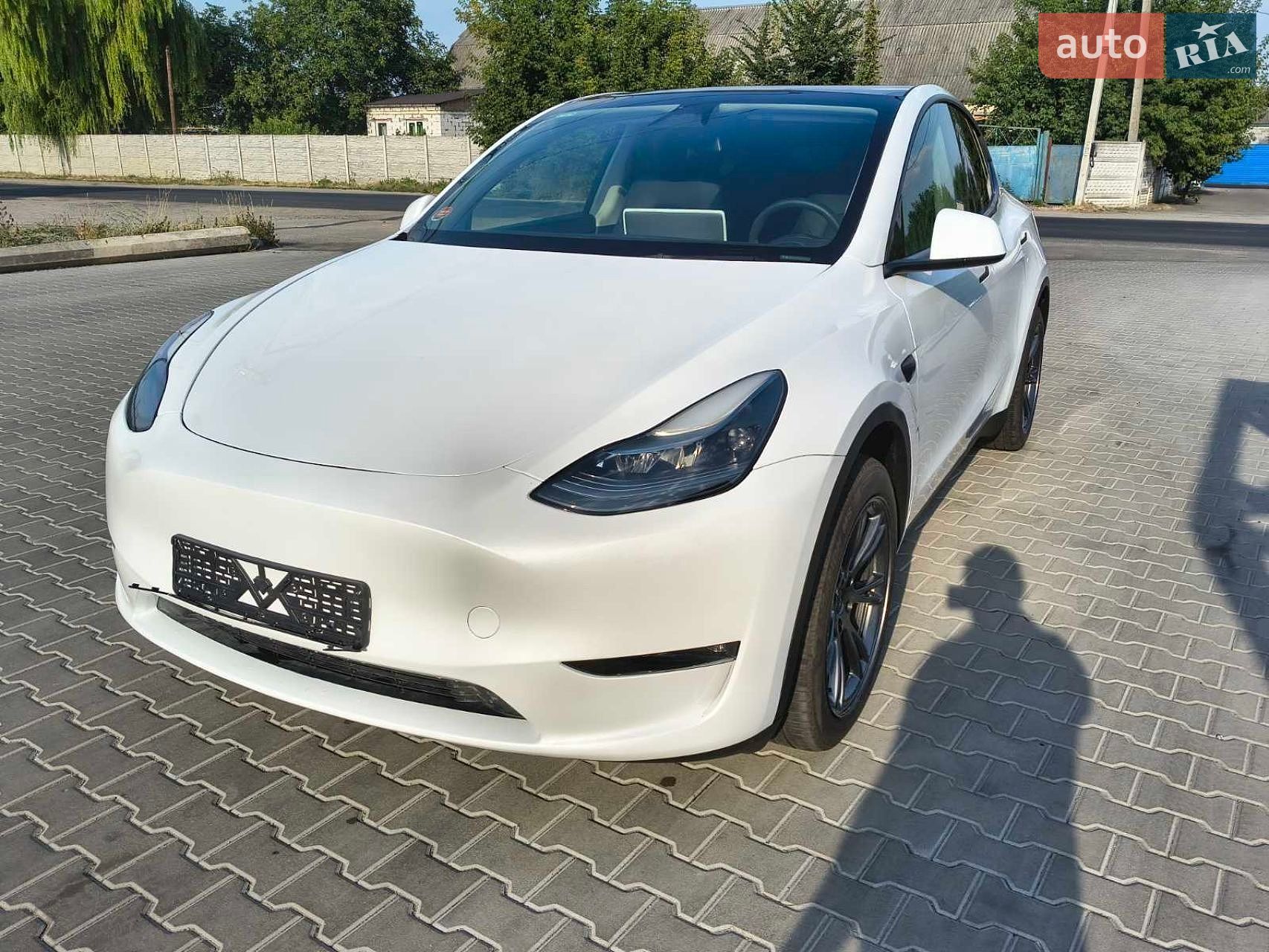 Tesla Model Y 2024 VIN 7SAYGDED9SA342374 фото оголошення 28 з 51