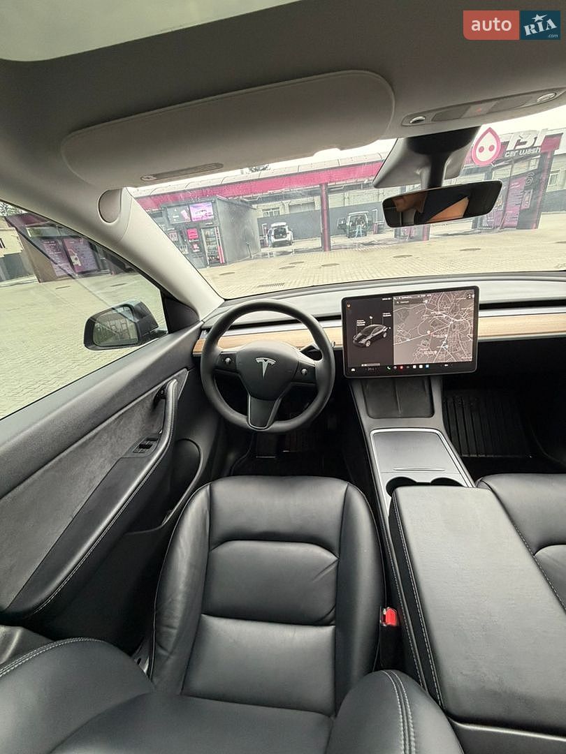Tesla Model Y 2021 VIN 5YJYGAEE0MF190687 фото оголошення 13 з 24