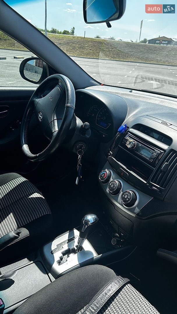 Hyundai Elantra 2010 VIN KMHDT41BBBU192364 фото оголошення 10 з 11