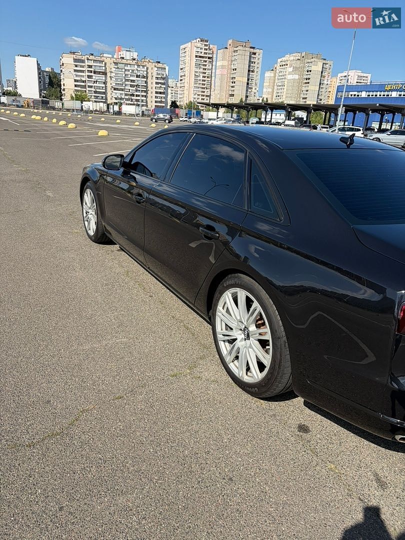 Audi A8 2014 VIN WAU3GAFD9FN028199 фото оголошення 4 з 16