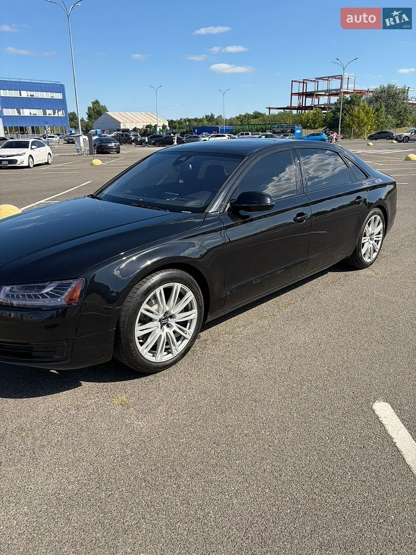 Audi A8 2014 VIN WAU3GAFD9FN028199 фото оголошення 3 з 16