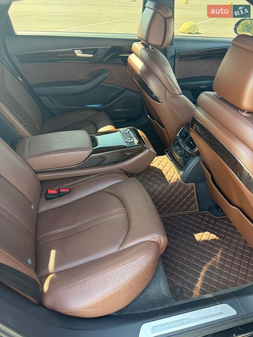Audi A8 2014 VIN WAU3GAFD9FN028199 фото оголошення 9 з 16