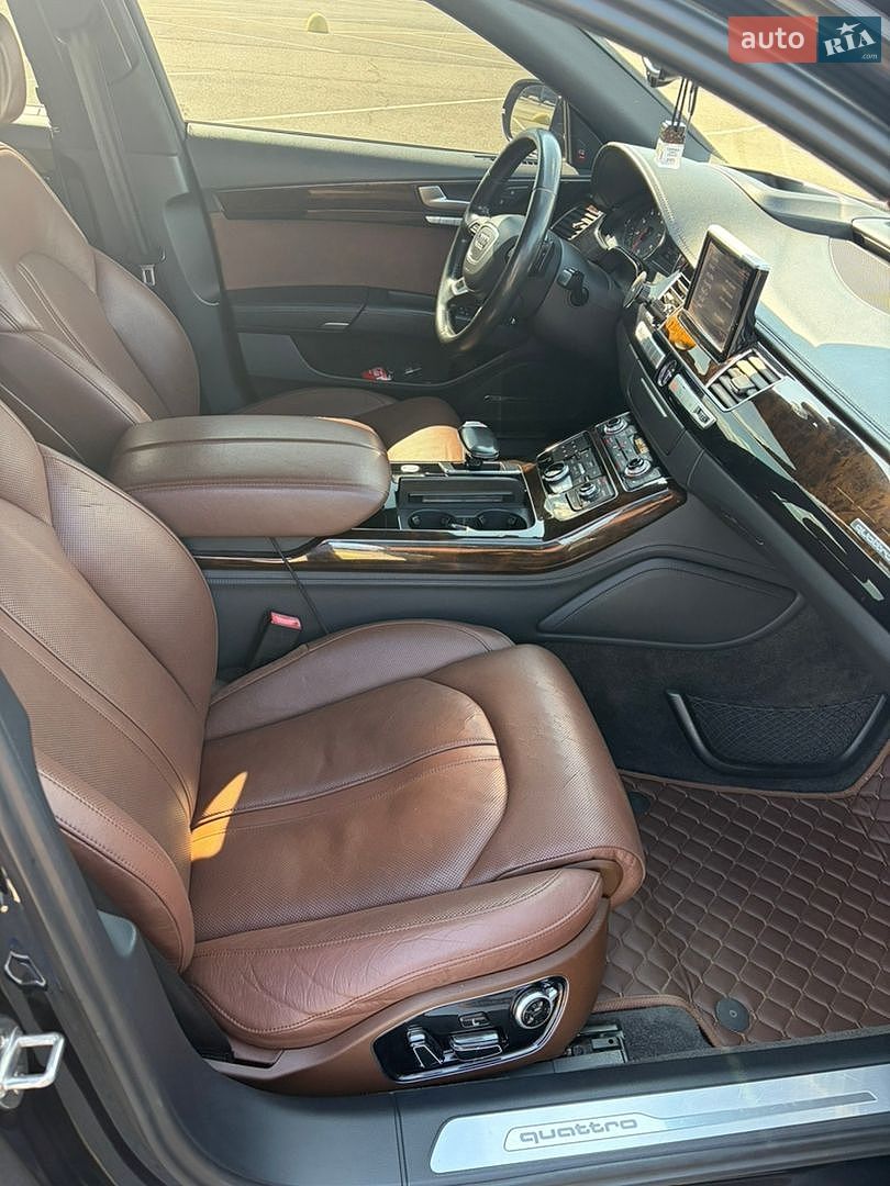 Audi A8 2014 VIN WAU3GAFD9FN028199 фото оголошення 10 з 16