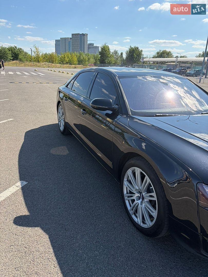 Audi A8 2014 VIN WAU3GAFD9FN028199 фото оголошення 7 з 16