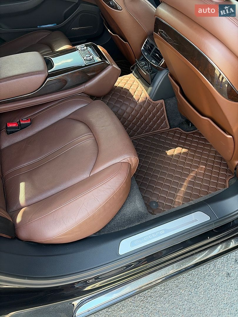 Audi A8 2014 VIN WAU3GAFD9FN028199 фото оголошення 16 з 16