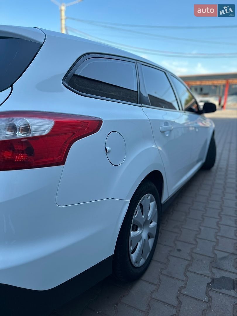 Ford Focus 2011 VIN WF0LXXGCBLBY35488 фото оголошення 8 з 14