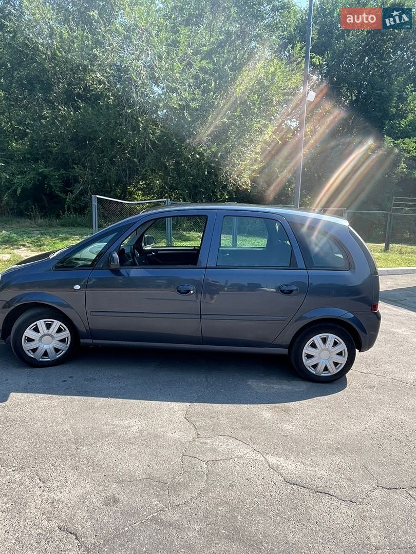 Opel Meriva 2009 VIN W0L0XCE7594315124 фото оголошення 7 з 15