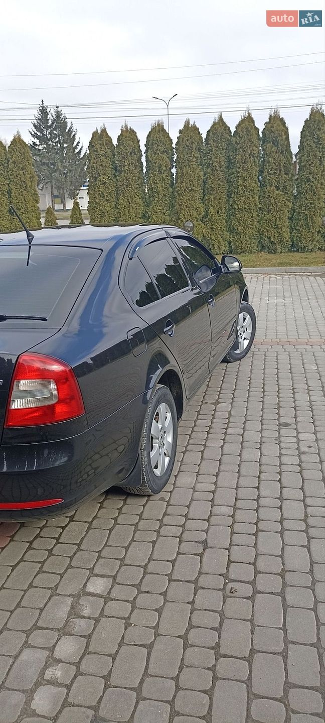 Skoda Octavia 2011 VIN TMBBK41Z7CB153751 фото оголошення 3 з 19